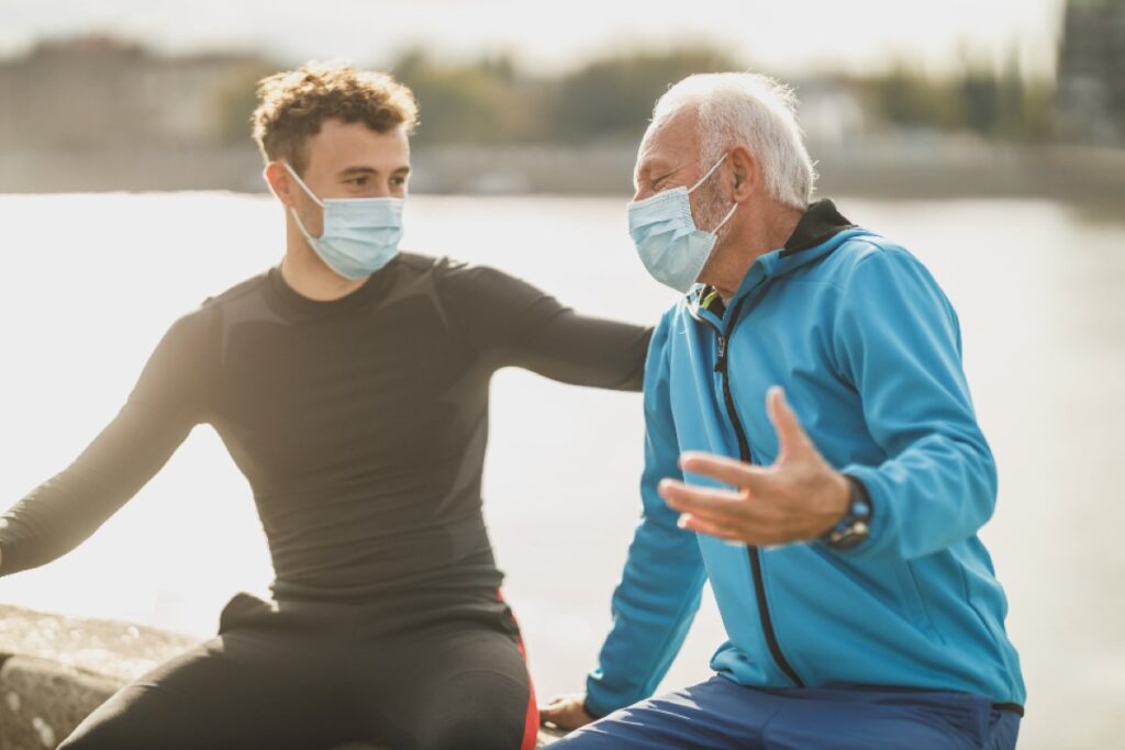 Two adult men having a discussion