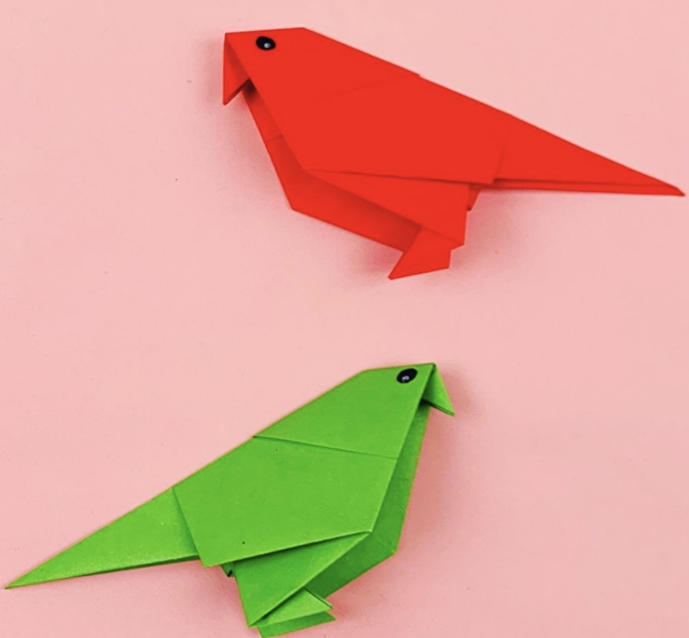 Colorful origami parrots