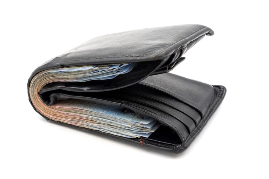 Wallet with a thick wad of bank notes