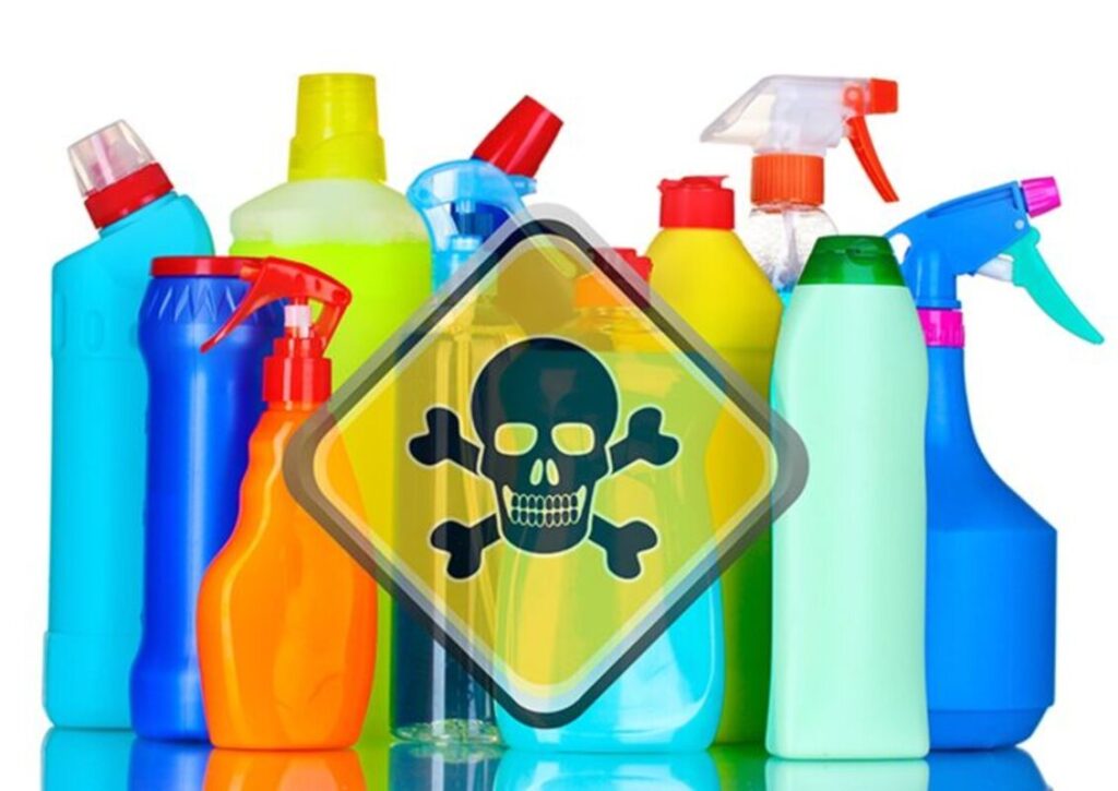 A group unlabelled cleaning products marked as toxic