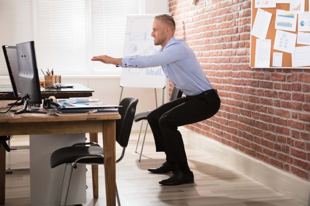 Man having a short workout break at the office