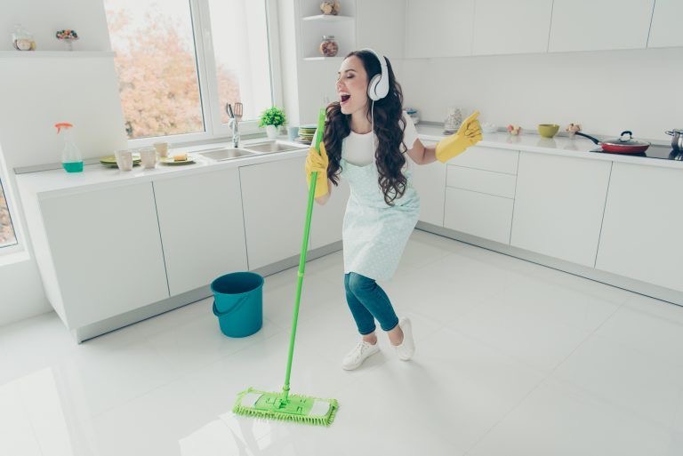 Cleaning lady listening to music