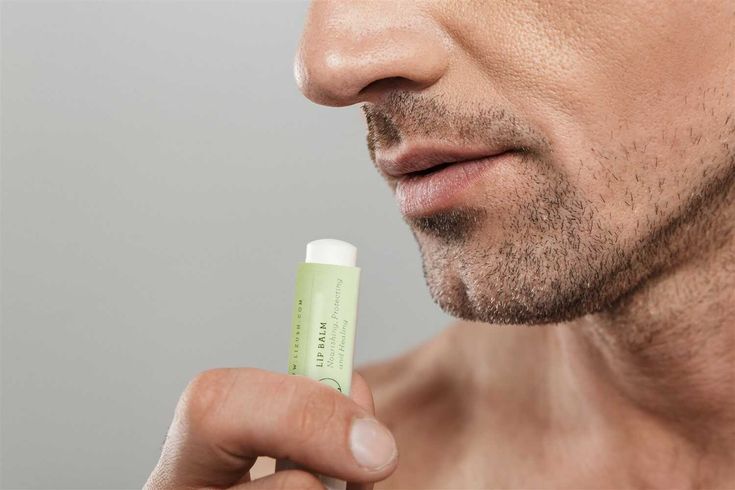 Man Using Lip Balm