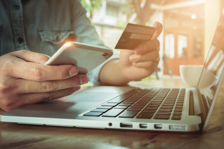 Man Making Credit Card Payments