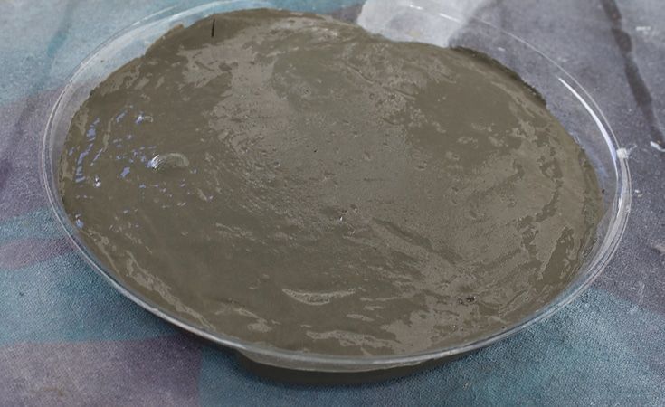 Concrete mixture poured into a pan 