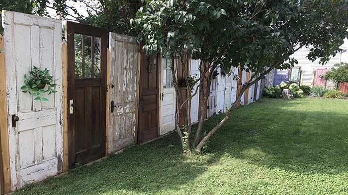 Repurposed Doors for a Unique Fence