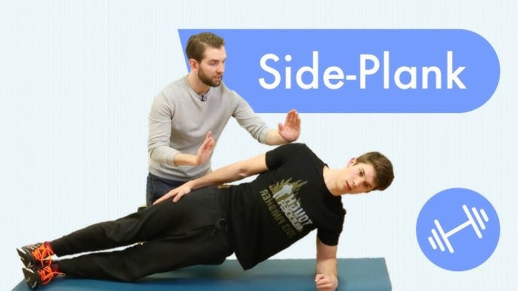 A trainer showing the correct method of doing a side plank