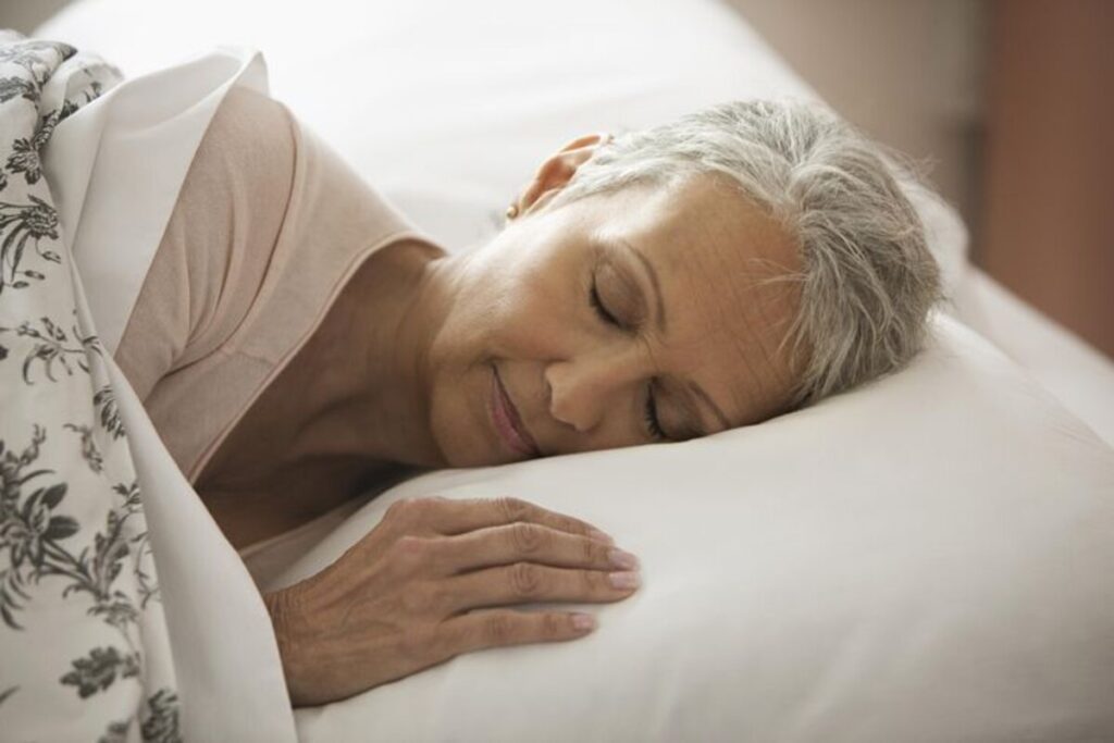 An elderly woman having a restful sleep