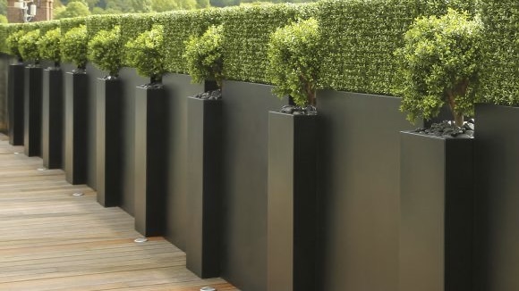 Tall Planters as Double-Duty Fences