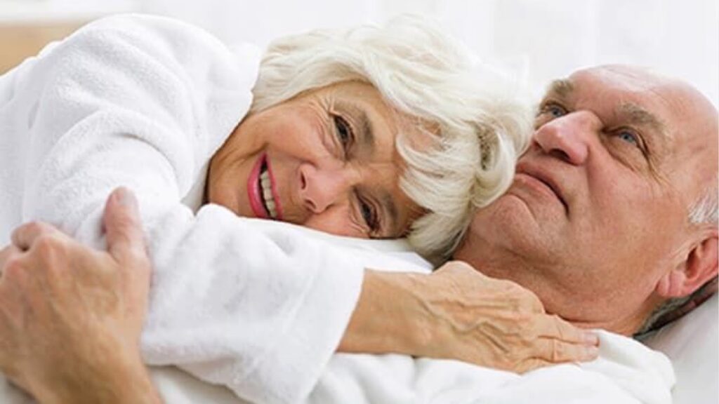 Aged Couple in Bed