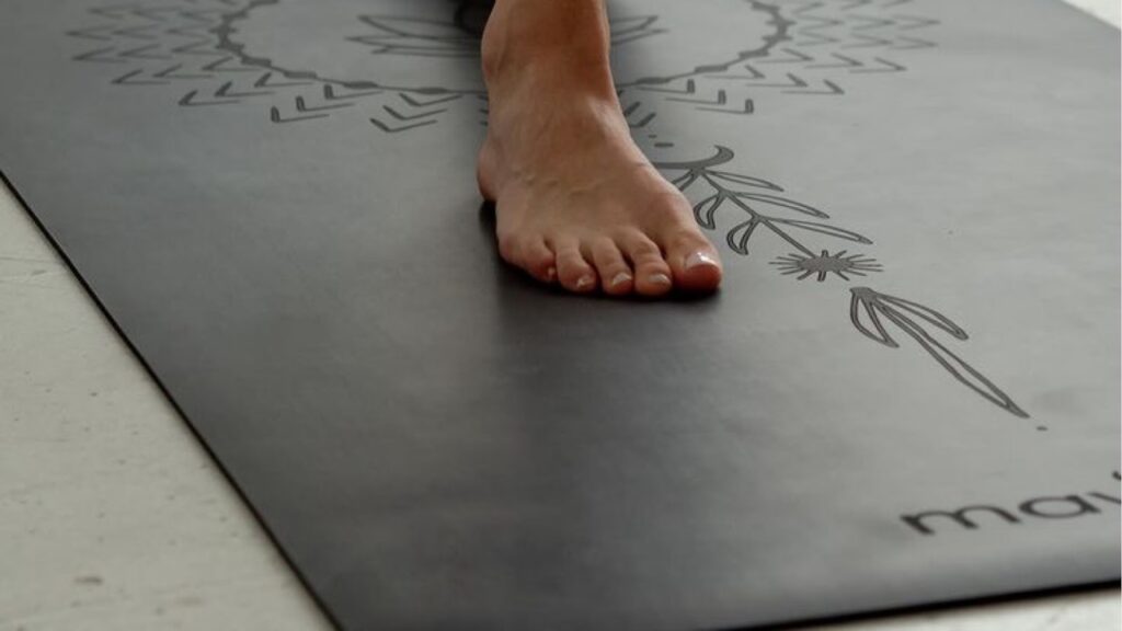 Person exercising on a workout mat