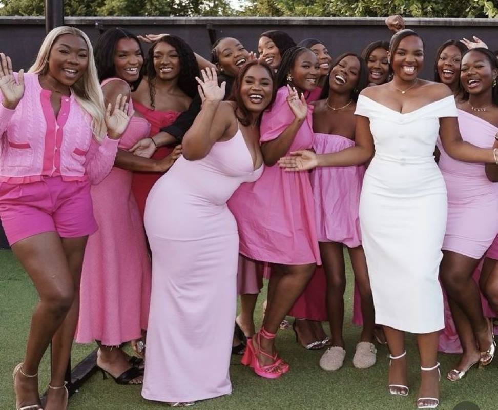 Bride and her bridesmaid standing out at a bridal shower