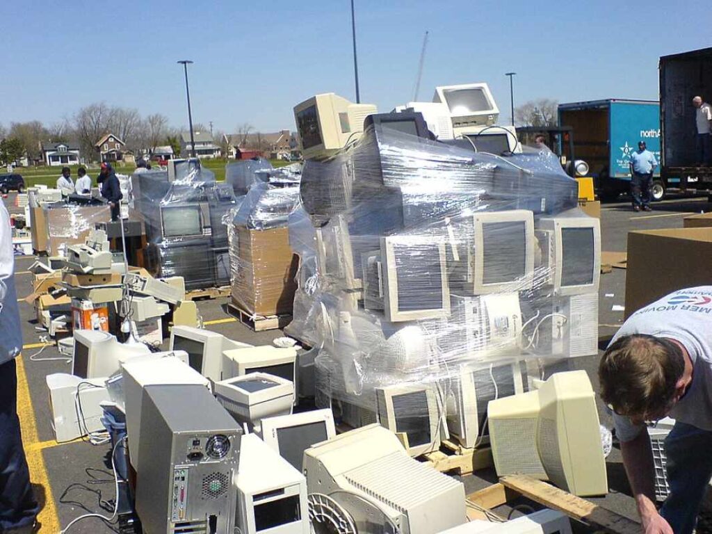 Cathode ray tube monitors being packed for shipping