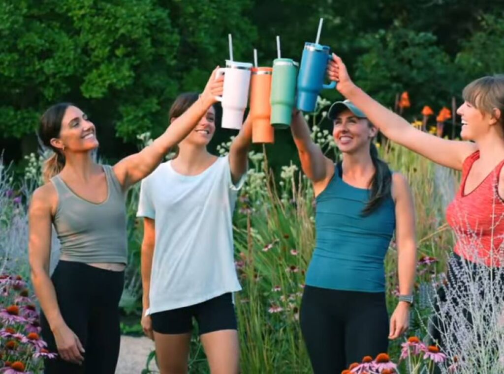 Friends toasting with RTIC tumblers