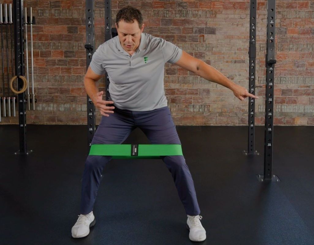 A man working out with a resistance band