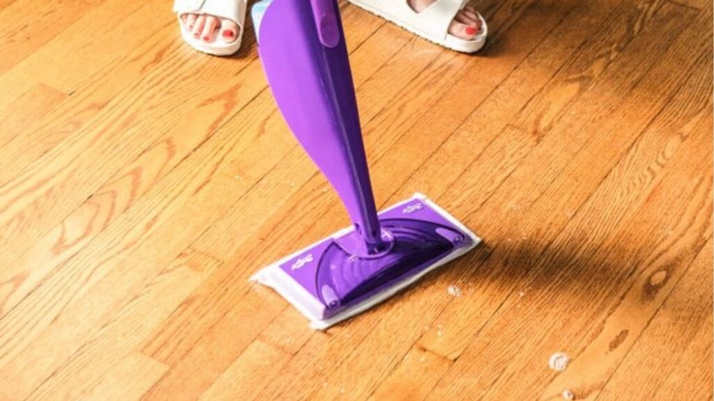 Person Vacuuming broken glass