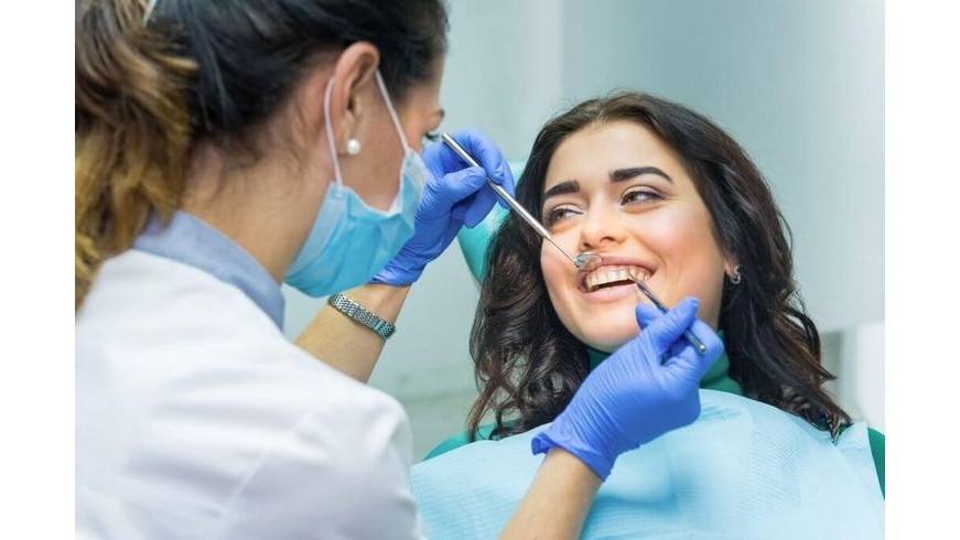 Seek Professional Dental Care to remove popcorn kernet from gum